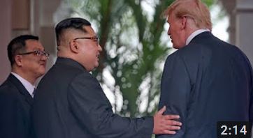 North Korea Kim hand on Trump arm.PNG