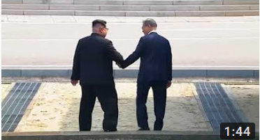 North Korea Kim holds hands with SK Pres.PNG