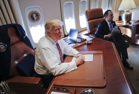 3C8BC81600000578-4160648-Trump_hung_an_Air_Force_One_bomber_jacket_on_the_back_of_the_sea-a-1_1485464834348.jpg